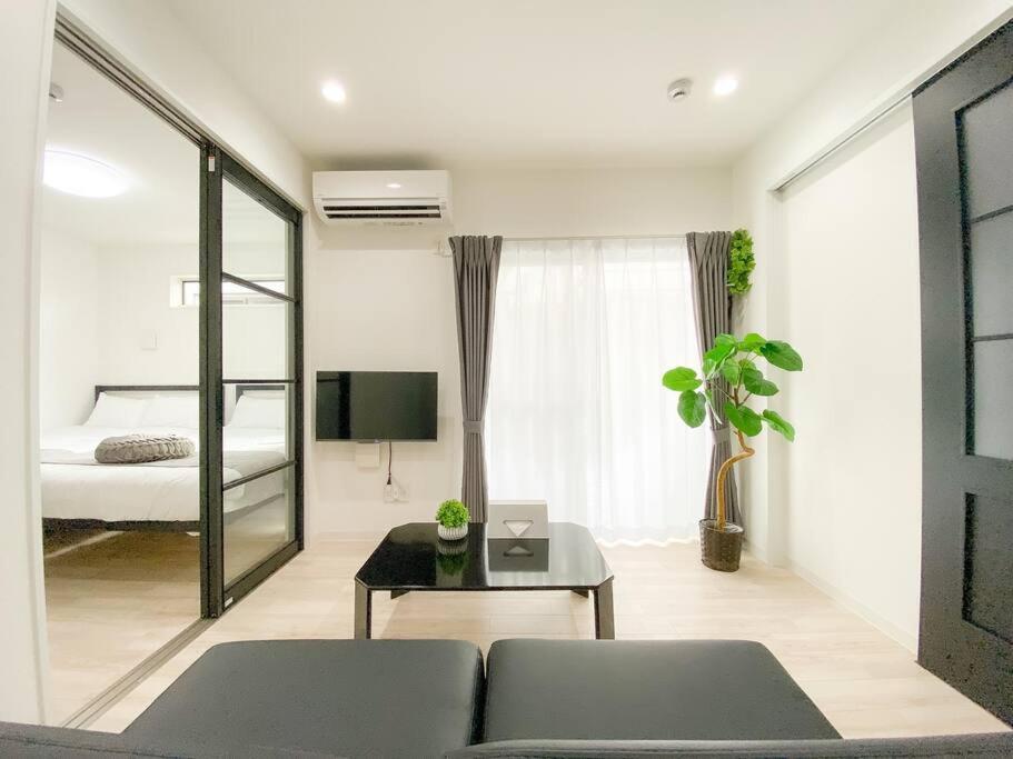 Residential Hotel Glitter Usjまで1駅5分 大阪 客房 照片