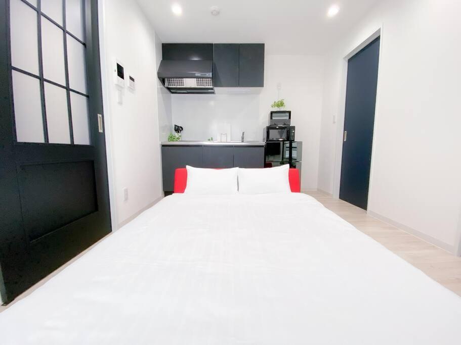 Residential Hotel Glitter Usjまで1駅5分 大阪 客房 照片