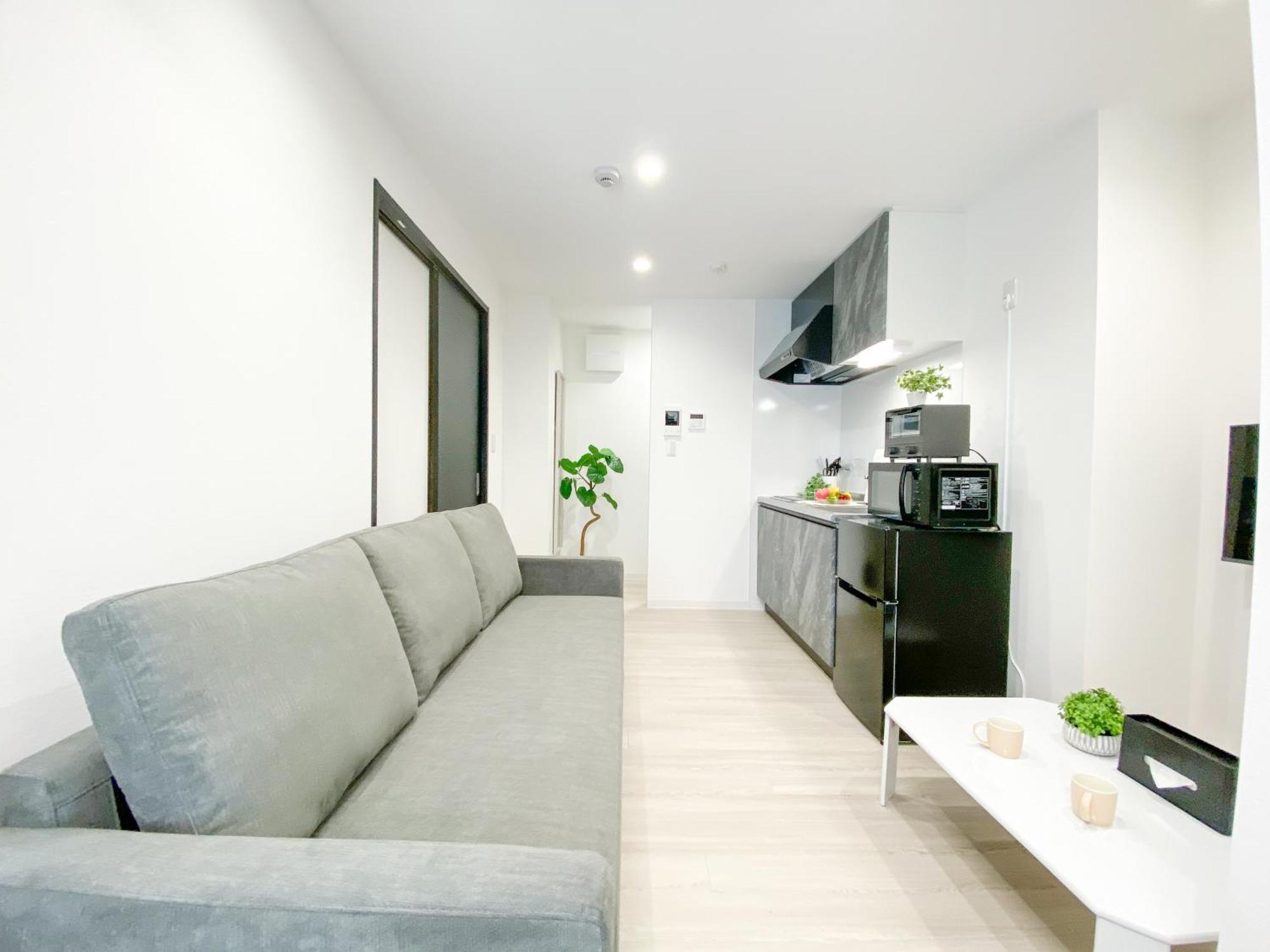 Residential Hotel Glitter Usjまで1駅5分 大阪 客房 照片