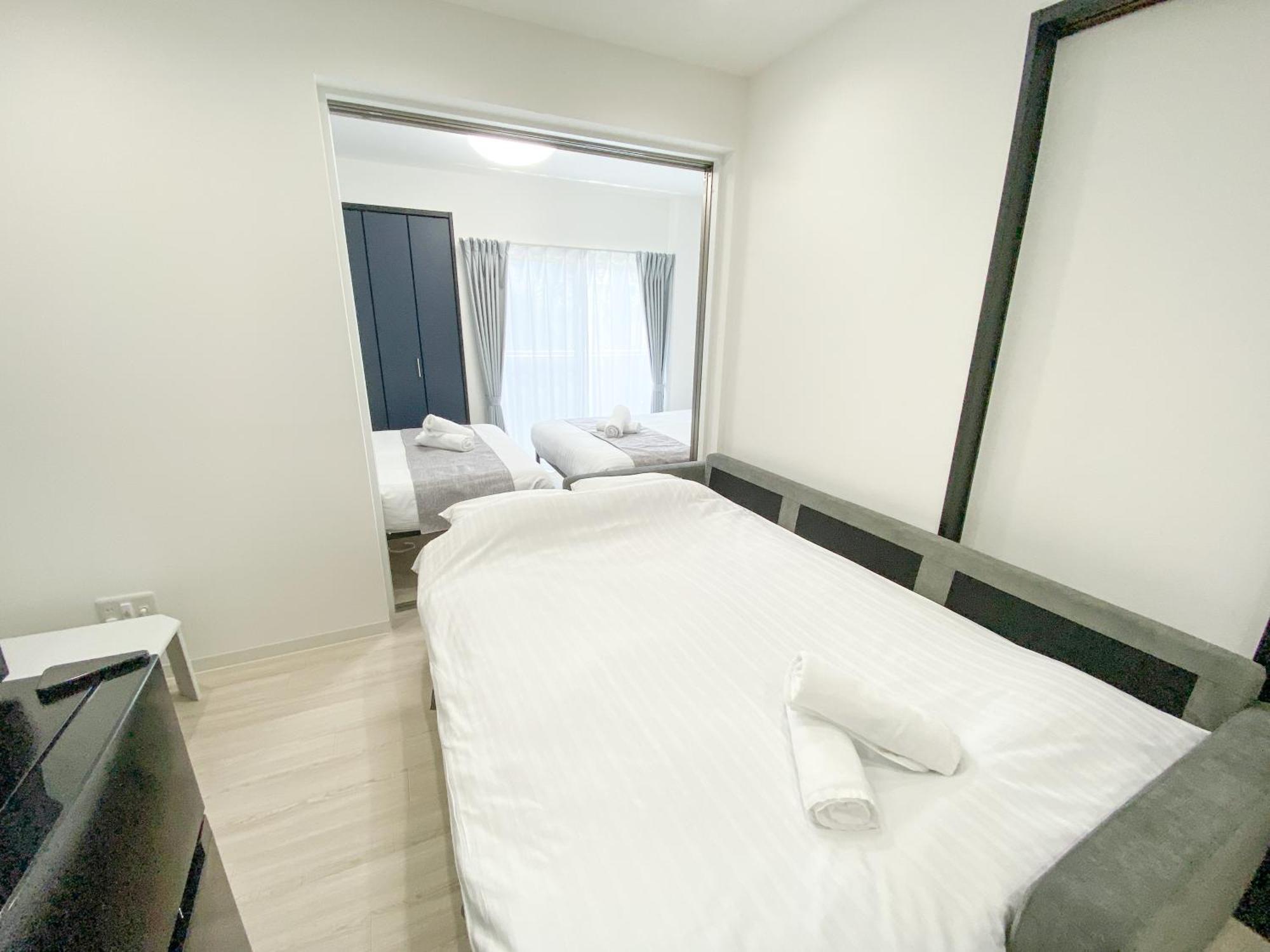 Residential Hotel Glitter Usjまで1駅5分 大阪 客房 照片